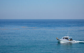 Aerial view of a private yacht on the Aegean Sea near Santorini